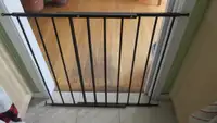 Black metal swing gate suitable for top of stairs