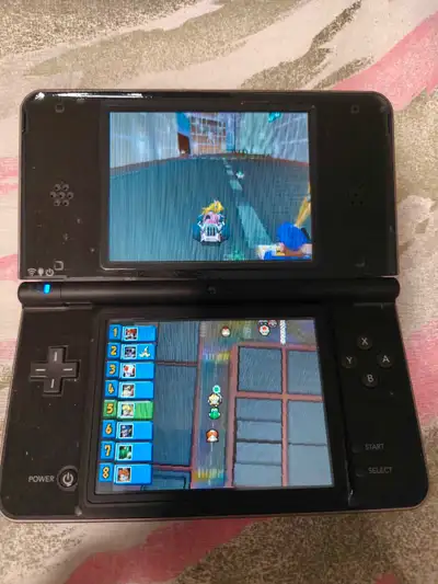 Nintendo DSi LL (XL) with R4 card (64 GB) + Games - $125, View more