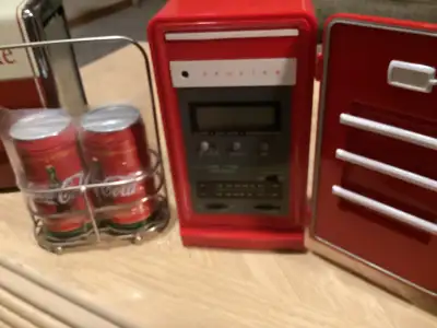 Coke napkins dispenser,coke salt&pepper shaker,coke radio with original box.