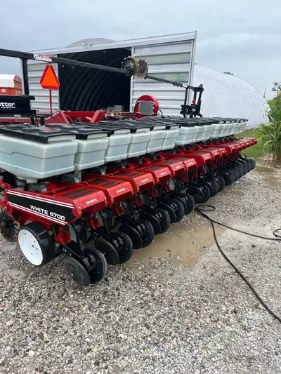 15-row White planter with no-till coulters, heavy-duty down pressure springs, yetter markers, and an...
