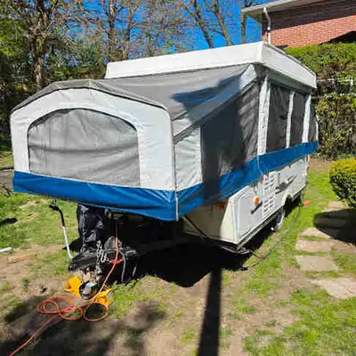 2013 PALOMINO TENT TRAILER, 12 feet long, 7 feet wide and 4 feet high when it is close, 19 feet long...