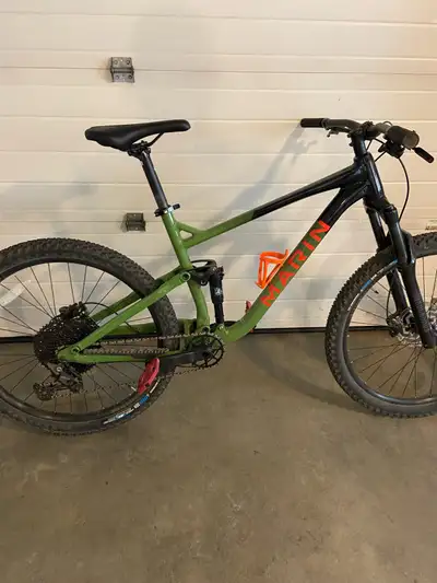 New condition 27.5 Marin bike. Full suspension very little riding. $2000 obo. 250-464-1692