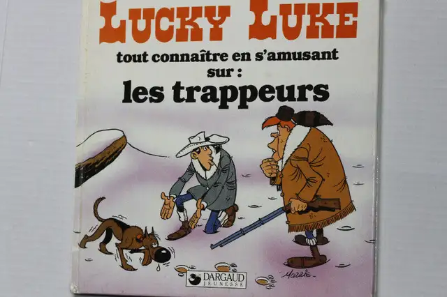 Livre de lecture pour enfants lucky luke sur les trappeurs.. in Comics & Graphic Novels in Laval / North Shore - Image 2