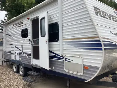 2013 25 ft Revere holiday trailer by Forest River with electric Jack and large slide. Perfect for a...
