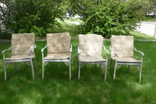 4 Light Brown coloured Chair Cushions, with a White Leaf Pattern