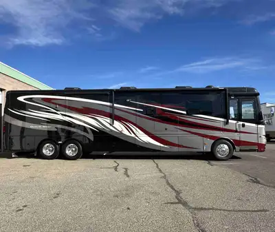 2014 Newmar Dutch Star 4369. 450HP Cummins sitting on a Freightliner chassis with Tag Axel and passi...