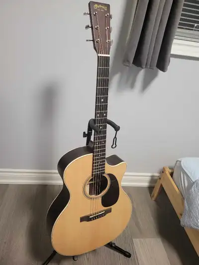 Martin GPC16E in a mint condition I'm not in rush to sell so any low baller will be ignored. Will pr...