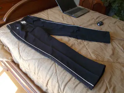 Athletic pants, men's small, NEW. Tags still on the pants. Zipper on legs. $20 obo. Smoke free home....