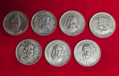 Seven early-1970s aluminum coins/tokens: Canadian explorers, View more