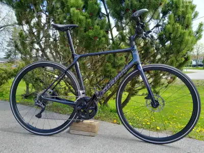 Selling full carbon fibre GIANT TCR hybrid bike, View more