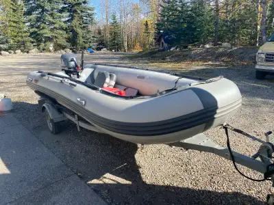 This pre-owned Seamax inflatable boat is a reliable 16-foot craft perfect for your next day on the w...