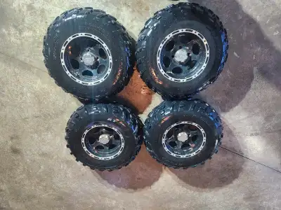 I got nice atv wheels with good tires on it. No plugs in them.