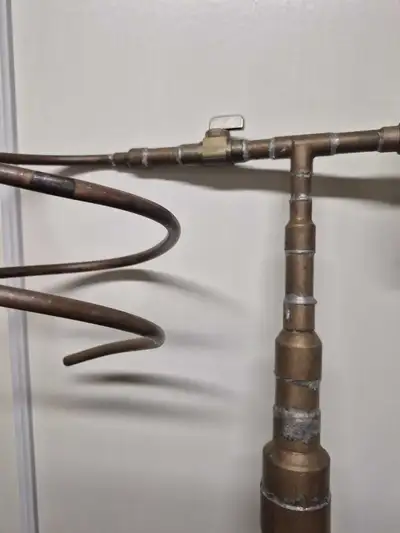 Copper 6 foot plus, 2 inch diameter reflux distillation head with temp gage and discharge tube, ss c...