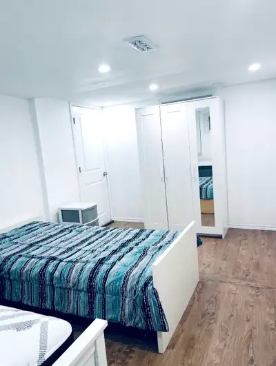 Bright, spacious furnished room in a raised bungalow basement with easy access (only a few steps). A...