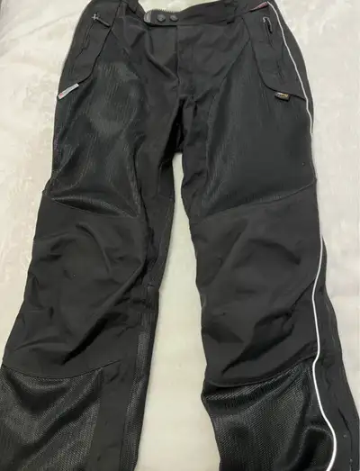 Women’s Olympia armoured motorcycle pants, size 10. Comes with the removable liner as well. Asking $...