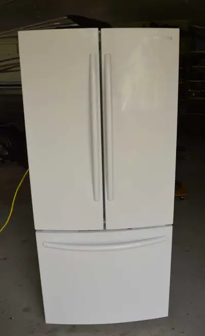 White Samsung French Door Refrigerator measures 30 inches wide 67 inches tall adjustable shelves fre...