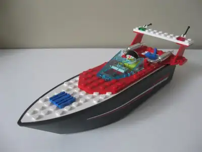 Lego Set: RIPTIDE RACER (#4002) From 1996. Set is complete. This set has 48 parts and 1 mini-figure....