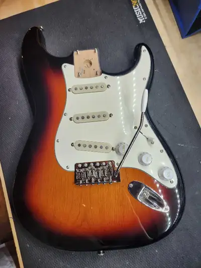 Here is a loaded 3 Tone Sunburst MIM Fender body. Pair it with the Fender neck I have posted. I'll c...