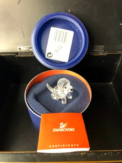 I'm offering a charming Swarovski Crystal Puppy, a delightful addition to any collection! This adora...