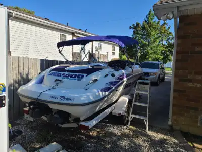 1998 Sea Doo jet boat dual 717cc engines, nice cosmetics both engines run well, little maintenance i...