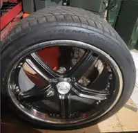 Four 20 inch summer tires on alloy rims
