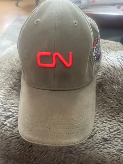 Spruce up your hat collection with this CN hat, a great addition for any railfan! In good condition,...