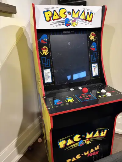 KIJIJI MESSAGING ONLY. Functioning Pac-Man arcade machine by Arcade1Up. Stands at approximately 46"....