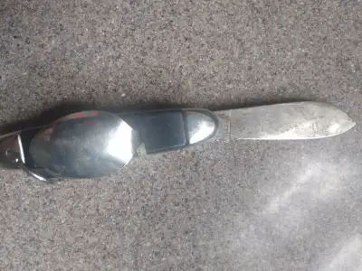 Hunting or camping sport.pocket knife Has spoon,fork, large blade , small blade Handy convenient sur...