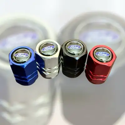 Upgrade your ride with these Ford Tire Valve Stem Caps! These caps are brand new and add a sleek, cu...