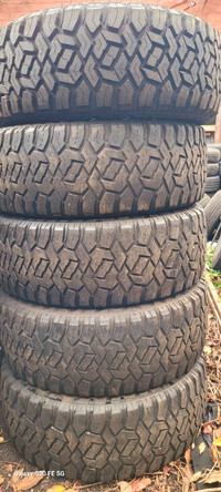 5 Mud Tires LT35X12.5X20 1 new tires& 4 used