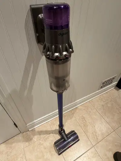 Dyson V11 with accessories Charger adaptor and wall mount Attachment heads Plus small furniture brus...