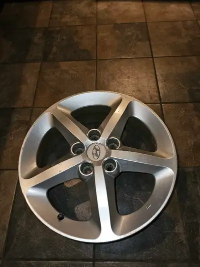These are original Hyundai 17-inch mags/rims, perfect for upgrading your ride or replacing damaged w...