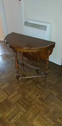 Beautiful antique solid wood folding Accent Table. Legs can be f
