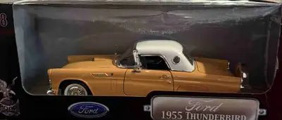I am selling a 1:18 scale model of a 1955 Ford Thunderbird, a classic collectible car. This model ha...