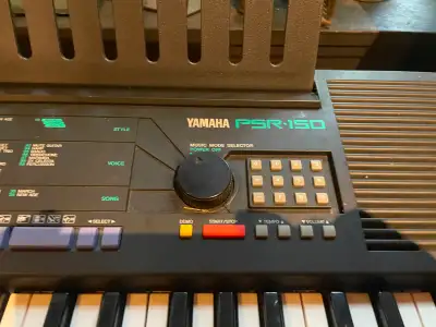 Yamaha PSR-150 keyboard with adapter, View more