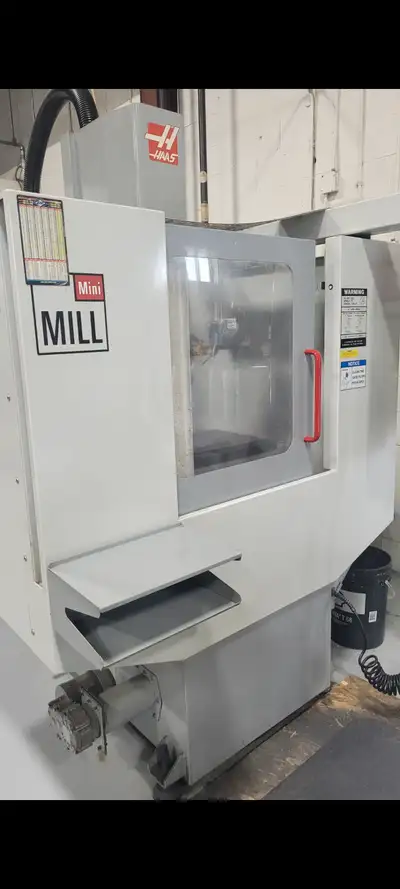 1 CNC VERTICAL MACHINING CENTER MAKE HAAS MODEL MINI MILL YEAR 2004 X Travel 16" Y Travel 12" Z Trav...
