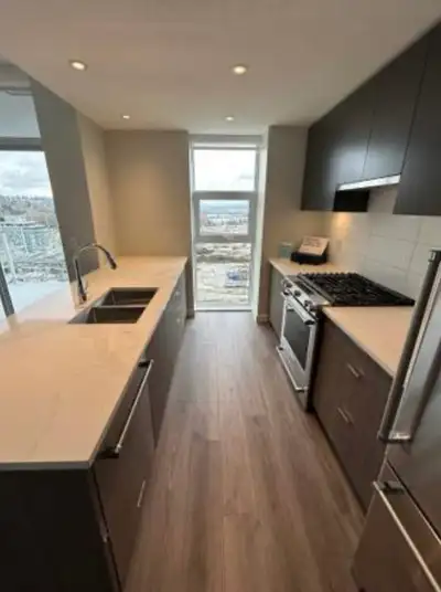 2 bedroom, 2 bath plus den on 16th floor in the beautiful Paradigm building in River District. Avail...