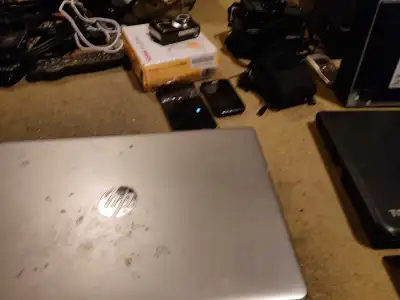 3 laptops,2 cameras,15 pat cords, View more