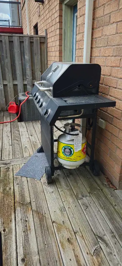EXCELLENT working 5-Burner Propane Gas Grill in Stainless Steel with Side Burner and Condiment Rack....