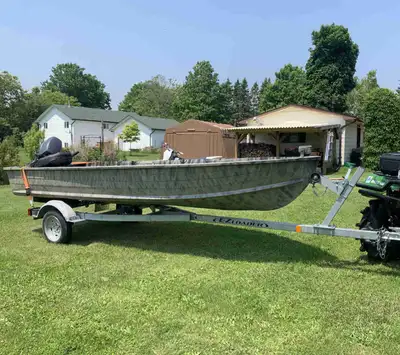 - 14ft Aluminum Boat The boat was repainted and seats were redone 2 years ago The boat is in good sh...