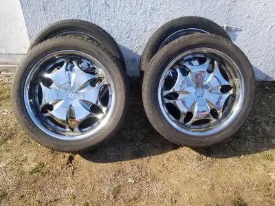 22" rims and tires Originally of an Escalade Must sell $600 obo