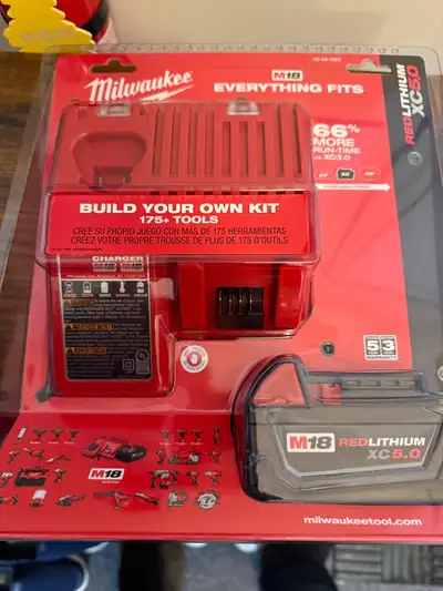 Milwaukee XC5 AH Battery & Charger - New, View more