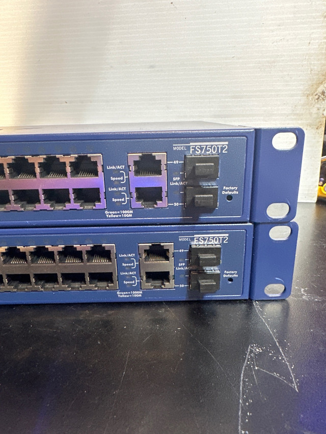 Netgear Prosafe 10/100 switch with 2 gigabit ports & Fibre  in Networking in City of Toronto - Image 3