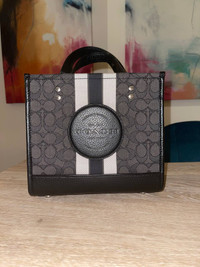 Brand-new Black Smoke Coach bag with the $350 original tag.
