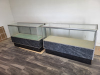 store glass display cases and painted display shelves on wheels