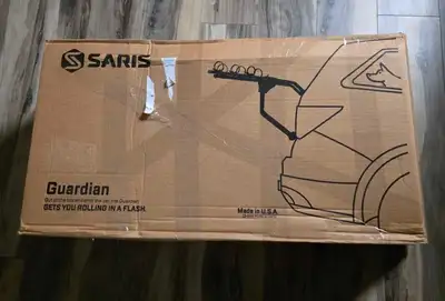 This is a brand new Saris Guardian 3-bike car rack, designed for easy and secure transport of up to...