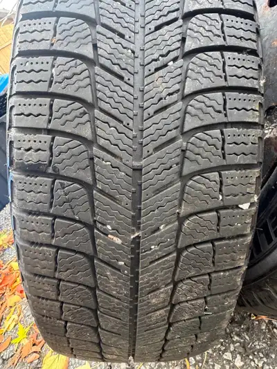 Selling a complete set of 4 Michelin X-Ice winter tires mounted on steel rims, previously used on a...