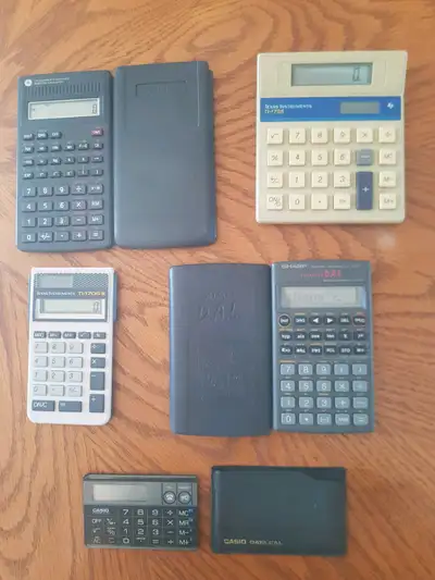 Scientific calculators , Sharp , Texas Instruments , battery and solar hybrid powered LCD display=$1...