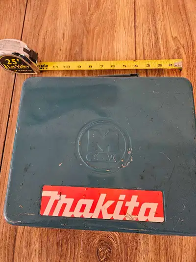 Makita drill, case, charger cord and drill bits, View more