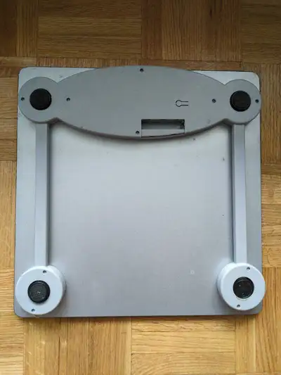This is a digital bathroom scale with a glass top. It has a maximum capacity of 400lbs. The display...